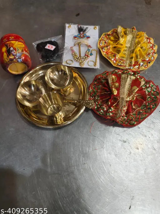 Pack of 6 Brass laddu gopal bhog thali with 2 poshak 1 sringhar set 1 bal 1 Kashi chandan
