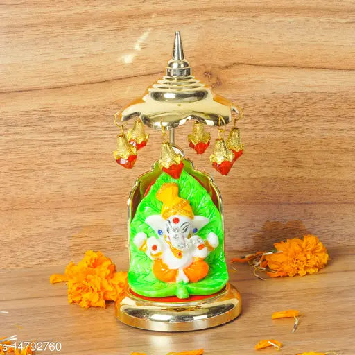 Polyresin Mukut Stone Leaf Design Ganesh Idol Statue with Gold Plate Chatri - Divine Elegance for Car Dashboard, Office, Study Table, Decor, Special Occasion Gifts.Divine Elegance: Polyresin Mukut Stone Leaf Design Ganesh Idol with Gold Plate Chatri emana