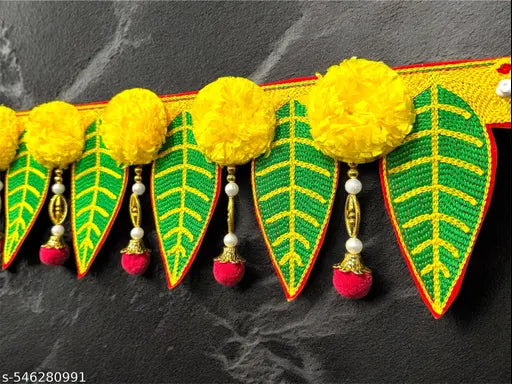 The ArtBllezon Handmade artificial marigold flower toran for home decoration.  diwali toran.