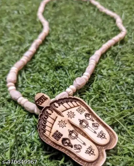 Tulsi mala original tulsi mala with Charan locket looks very beautiful