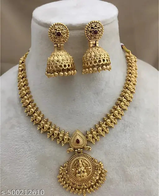 Antique Matte Gold-Plated Lakshmi Temple Necklace Set with Designer Jhumkas.Lakshmi Devi pendant.ornate jhumka earrings.