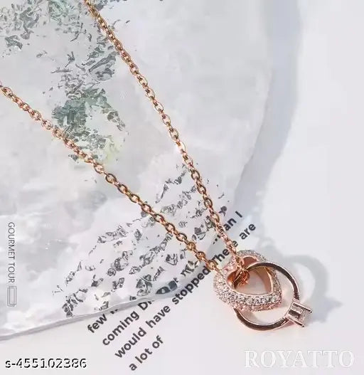 A beautifully crafted love heart pendant made from high-quality Rose gold- stainless steel and adorned with sparkling zircon stones, perfect