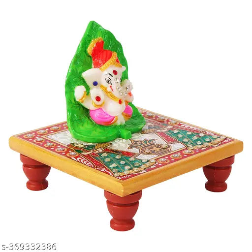 Marble & Polyresin Leaf Pagri Ganesh Stone Desin with Marble Chowki Stand Artistic Elegance for Every Occasion.Divine Aura: The presence of Lord Ganesh, adorned with a leaf pagri, exudes a divine aura, making it an ideal addition to car dashboards, office