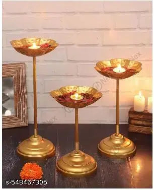 TAJ BOWL URLI WITH CANDLE STAND FLOATING DIYA Urlis find a special mention in our traditional styles of home decor