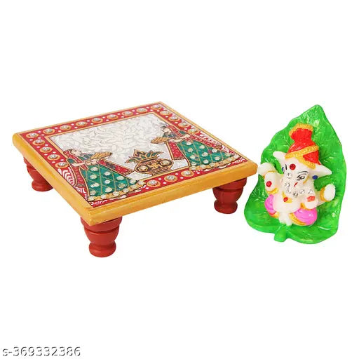Marble & Polyresin Leaf Pagri Ganesh Stone Desin with Marble Chowki Stand Artistic Elegance for Every Occasion.Divine Aura: The presence of Lord Ganesh, adorned with a leaf pagri, exudes a divine aura, making it an ideal addition to car dashboards, office