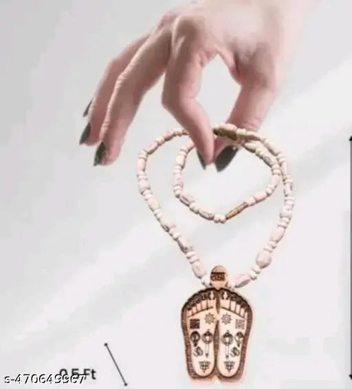 Tulsi mala original tulsi mala with Charan locket looks very beautiful