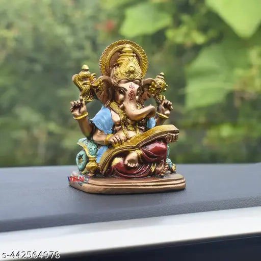 Small Reading Ramayan Ganesha for Car Dashboard and Home Decor
