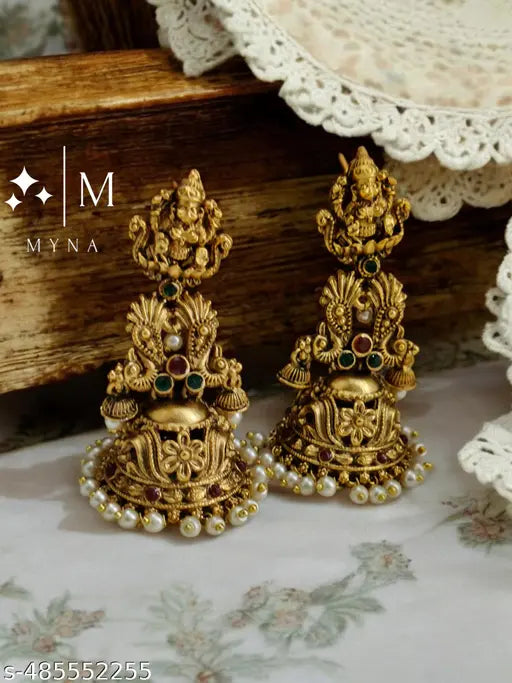 Myna jewellery premium quality jumka in temple finish comes with beautiful white swaroski pearls with Lakshmi engraving