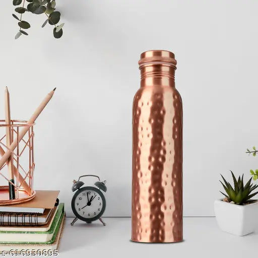 Copper bottle with Dimond cut design