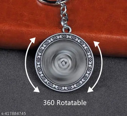 ROTATING SKULL METAL KEYCHAIN