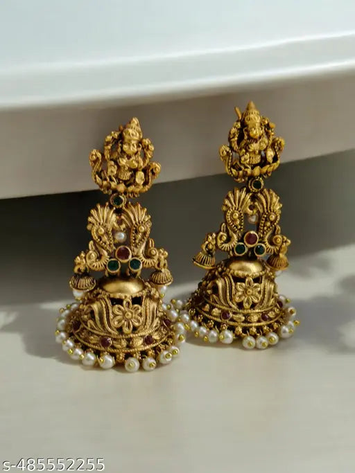 Myna jewellery premium quality jumka in temple finish comes with beautiful white swaroski pearls with Lakshmi engraving