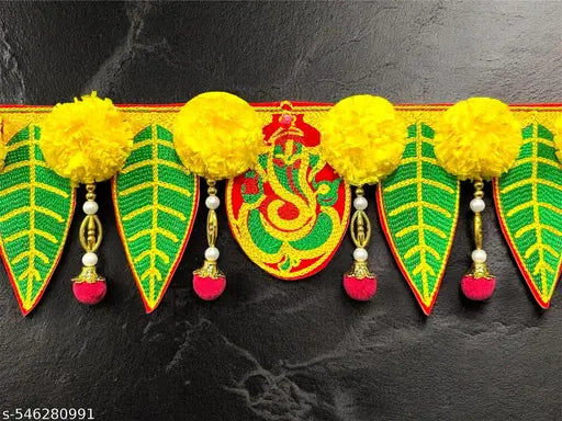 The ArtBllezon Handmade artificial marigold flower toran for home decoration.  diwali toran.