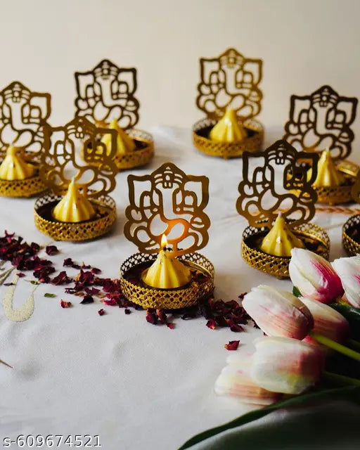 GARDEN DECO Ganesha Ji Metal T- light holder ( Pack of 4 Golden)