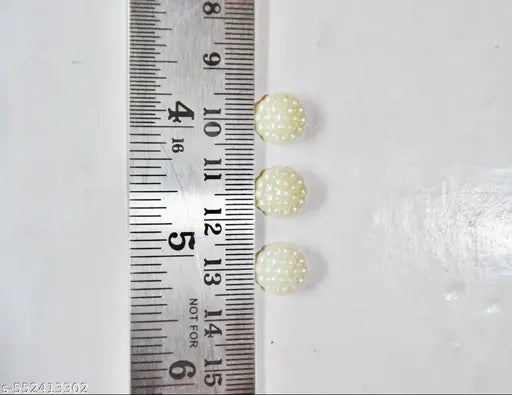 10mm sugar half round cream moti. Use for art and craft design accessories and also jwellery making accessory. 300 piece per order