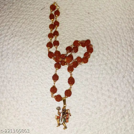 Rudraksha Mala with Hanuman Pendant - Empowering Jewelry for Strength, Protection, and Spiritual Connection | Rudraksha Mala | Hanuman pendant | transformative power | empowering jewelry |
