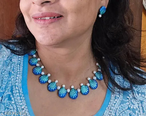 Trendy Terracotta chokwe in peacock blue