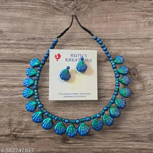 Trendy Terracotta chokwe in peacock blue