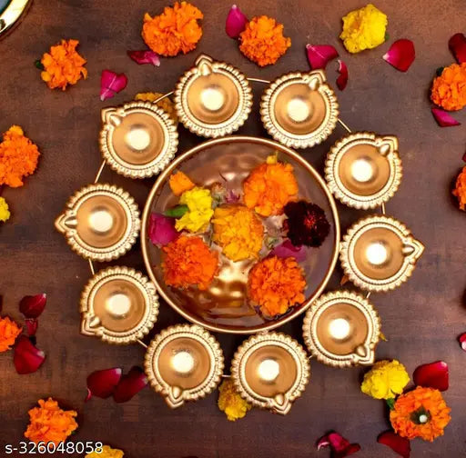 Pooja thal set includes  diya