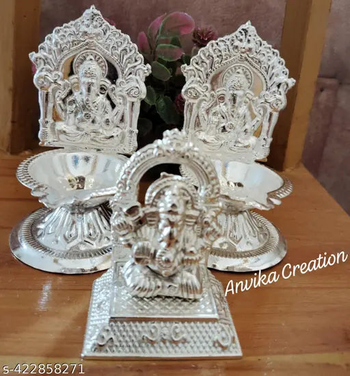 Silver Plated Set Of 2 Ganesha Diya And Ganesha Idol