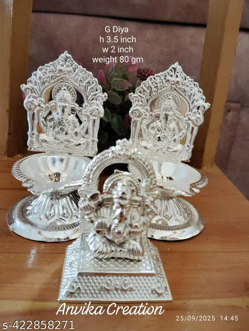 Silver Plated Set Of 2 Ganesha Diya And Ganesha Idol