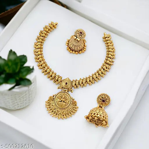 Antique Matte Gold-Plated Lakshmi Temple Necklace Set with Designer Jhumkas.Lakshmi Devi pendant.ornate jhumka earrings.