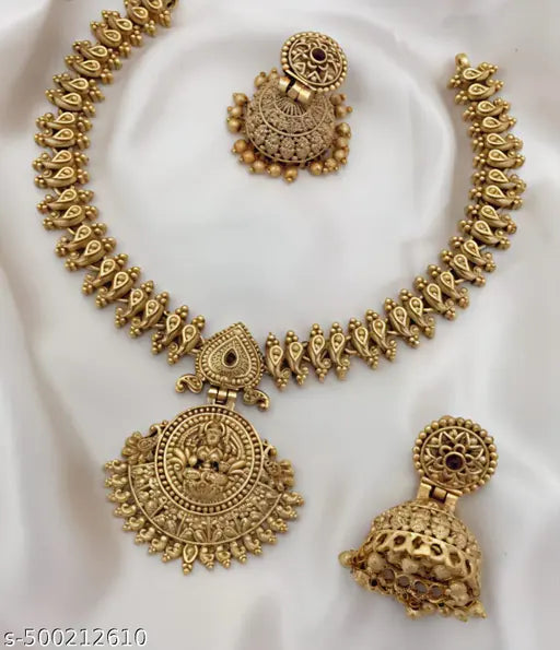 Antique Matte Gold-Plated Lakshmi Temple Necklace Set with Designer Jhumkas.Lakshmi Devi pendant.ornate jhumka earrings.